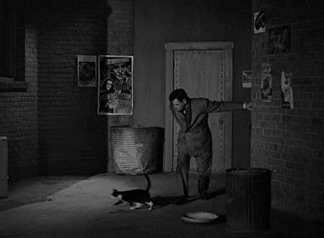 The Whistler - Conrad Richard Dix entering alley with tuxedo cat running away from garbage can