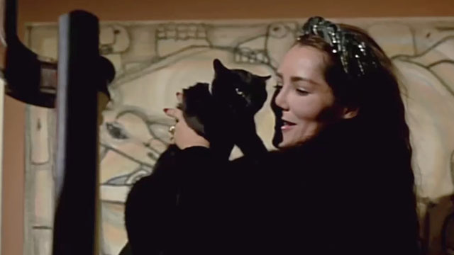 Wicked Stepmother - Priscilla Barbara Carrera holding black cat Pericles