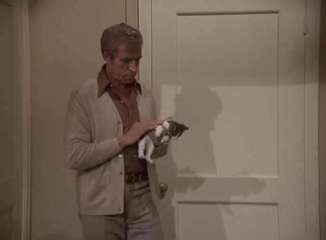 Charlie's Angels - Angel Trap - Jericho Fernando Lamas holding gray and white tuxedo kitten