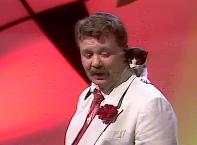 Hale & Pace - Season One, Episode One - Gareth Hale on stage with tuxedo kitten on shoulder