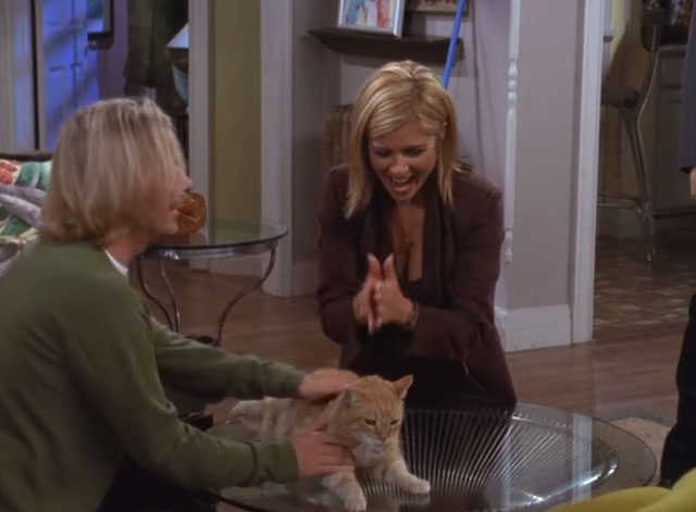 Just Shoot Me - Finch Chasing Amy - Finch David Spade with recovered ginger and white tabby cat Mr. Caramel and Amy Tiffani Thiessen