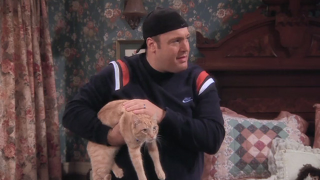 The King of Queens - Inn Escapable - Doug Kevin James holding orange tabby cat Marmalade