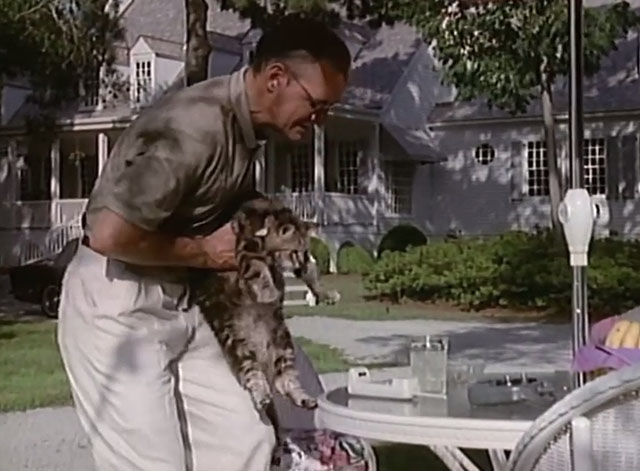 Matlock - The Dare - Malcolm Engel Terry O'Quinn picking up longhair brown tabby cat Mo from chair