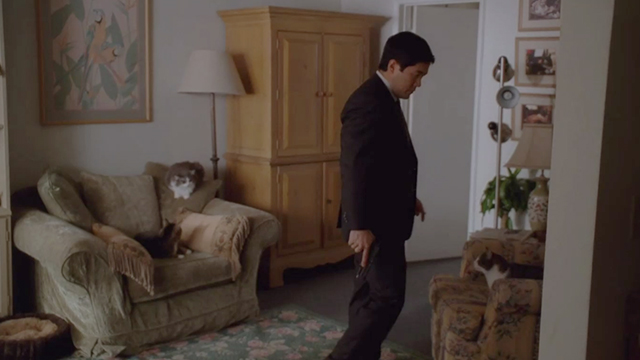 The Mentalist - Red Sky in the Morning - Cho Tim Kang looking cat on chair with two cats on couch behind