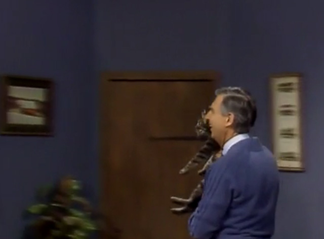 Mister Rogers' Neighborhood - Fred Rogers carrying Jimmy tabby cat to door