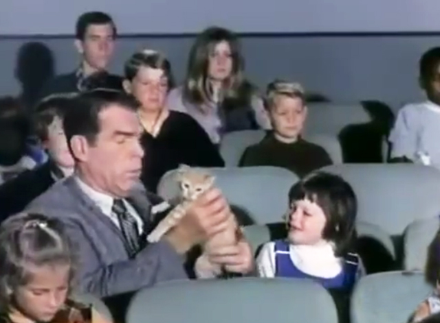 My Three Sons - The Littlest Rebel - Steve Fred MacMurray holding tiny ginger tabby kitten in movie theater with Dodie Dawn Lyn