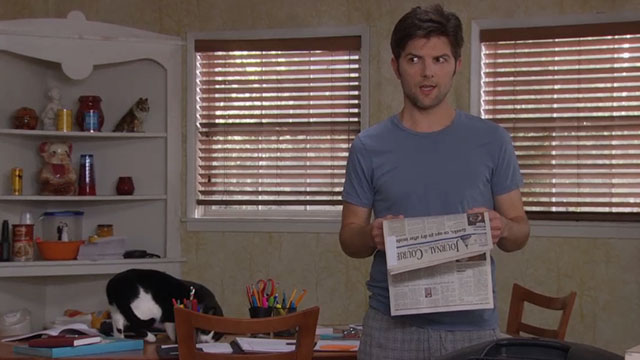 Parks and Recreation - Live Ammo - Ben Adam Scott with tuxedo cat behind him