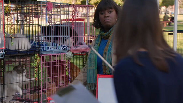 Parks and Recreation - Live Ammo - Donna Retta with cats in cages for adoption fair in park